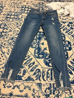 Distressed Dark Blue Skinny Jeans with Frayed Ankles